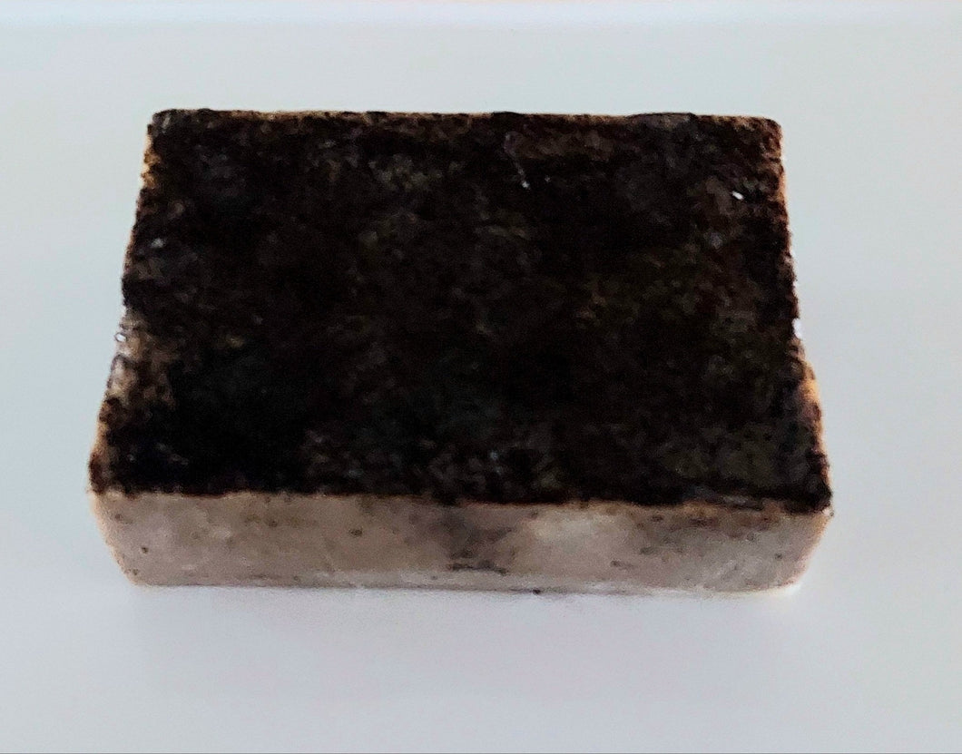 Coffee soap infused with coffee essential oils and real coffee grinds